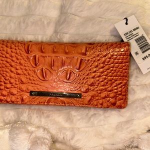 Brahmin Melbourne wallet in the color poppy brand new never used plastic still